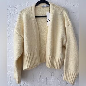 Knit light yellow sweater